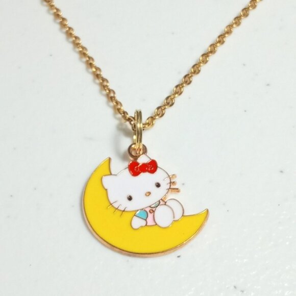 Hello Kitty Gold Plated Yellow Moon Pendant Necklace New - Picture 1 of 4